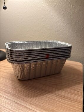 8 throw away tins